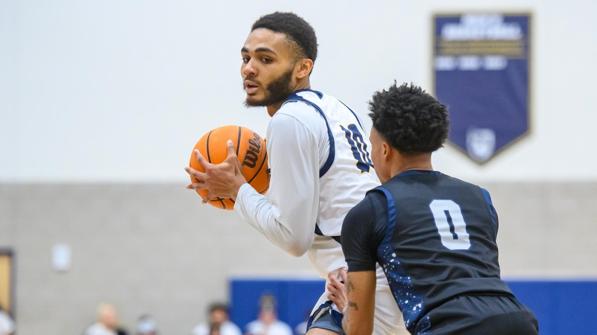 Men's Basketball Fends Off Cadets in GNAC Semifinals Thursday Night, 69-60